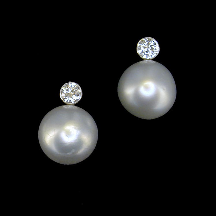 A Pair Of Cultured South Sea Pearl And Diamond Earstuds