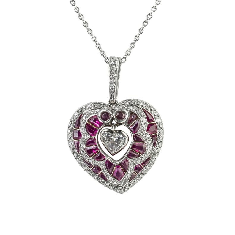 A Ruby And Diamond Heart Shape Pendant