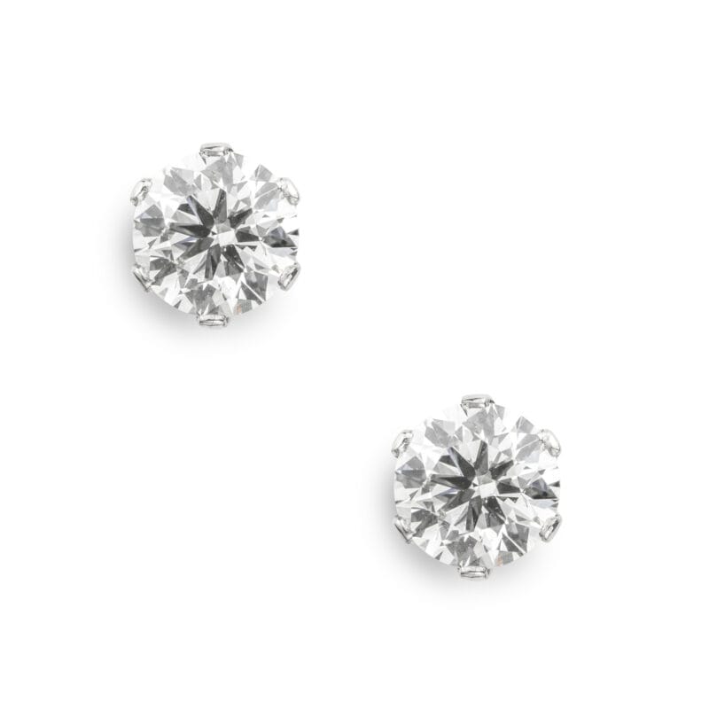 A Pair Of Single Stone Diamond Stud Earrings
