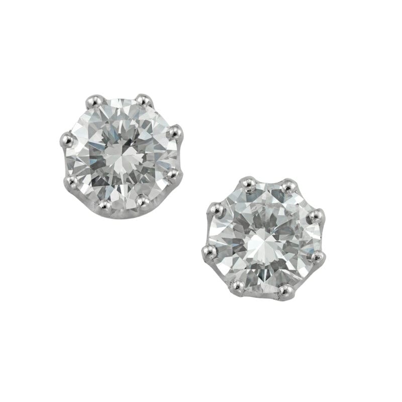A pair of diamond stud earrings