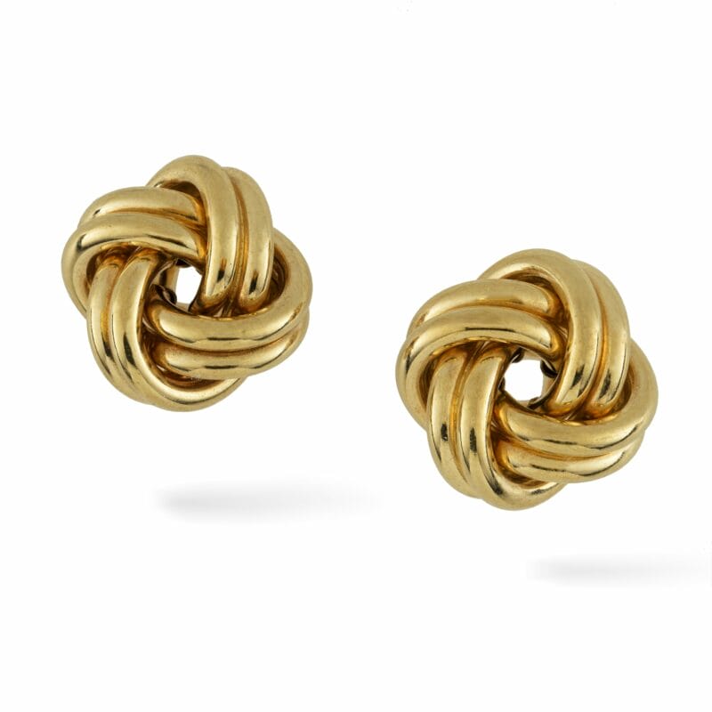 A Pair Of Gold Stud Earrings