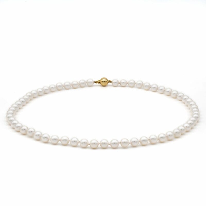 A Cultured Pearl Necklace With Gold Bal Clasp