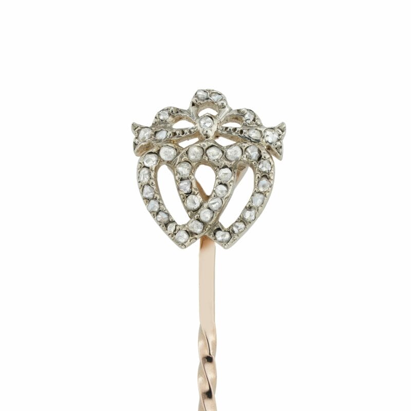An Edwardian diamond double-heart stick-pin