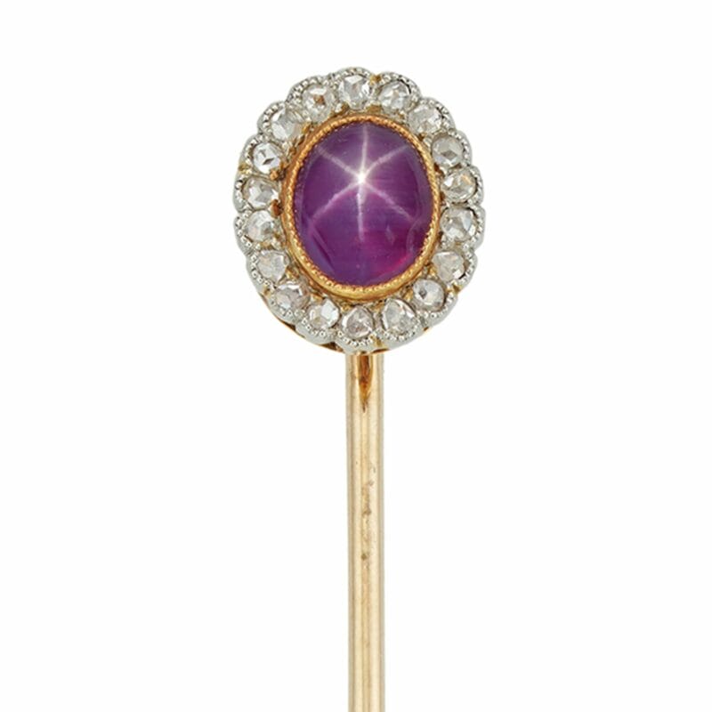 An Edwardian Star Ruby And Diamond Cluster Stick Pin