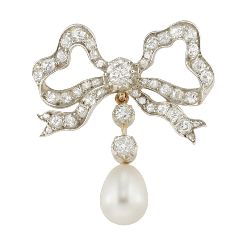 An Edwardian natural pearl and diamond bow brooch