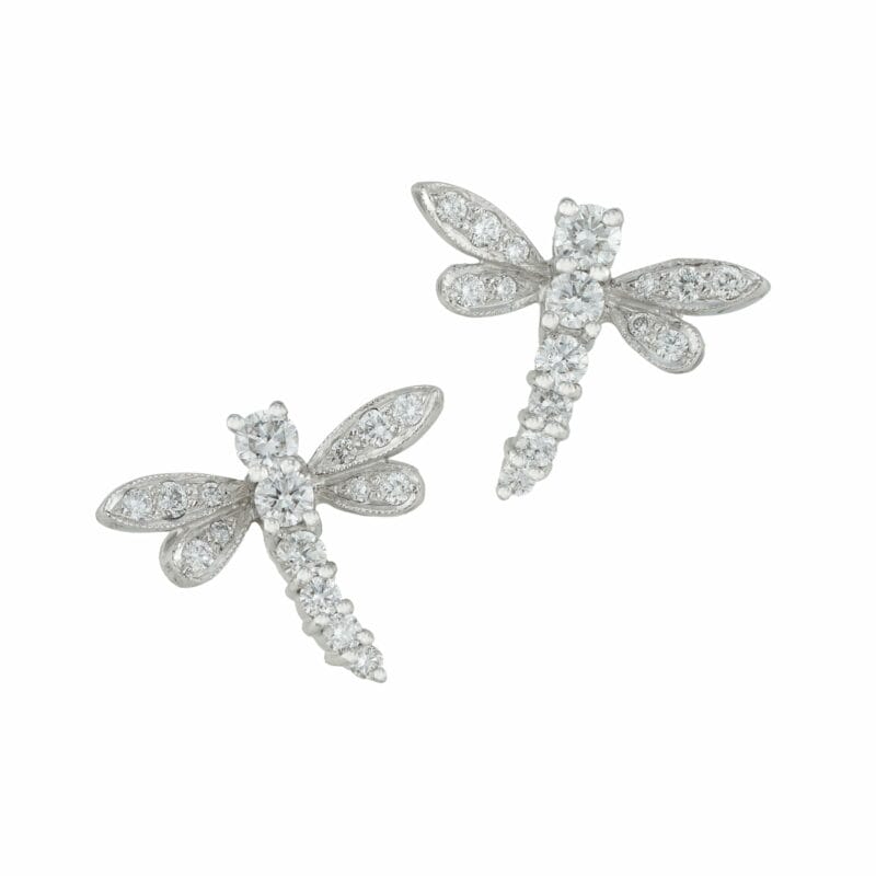 A pair of diamond dragonfly earrings in white gold