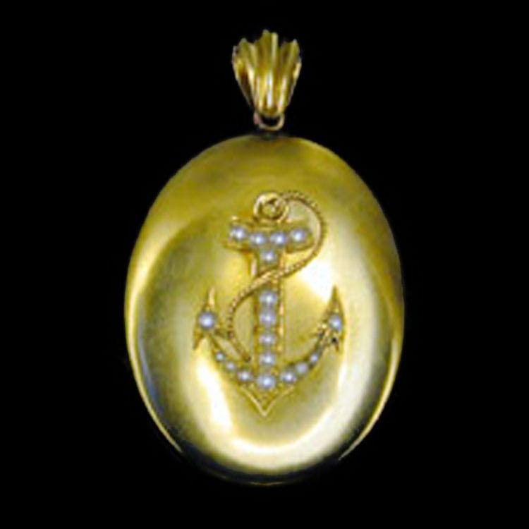 A Victorian Oval Yellow Gold And Pearl Anchor Locket