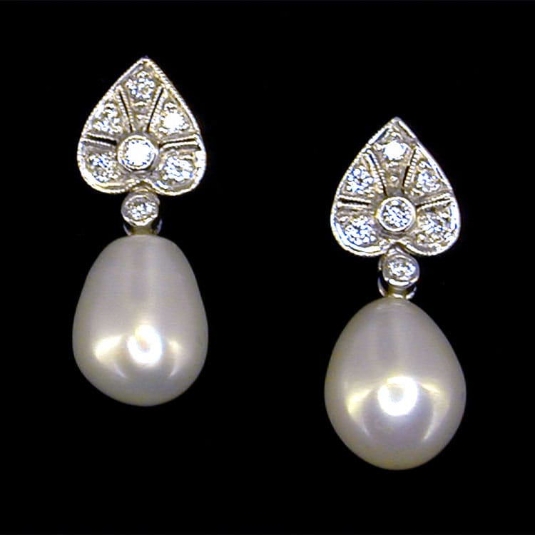 A Pair Of Diamond And Cultured Pearl Drop Earrings