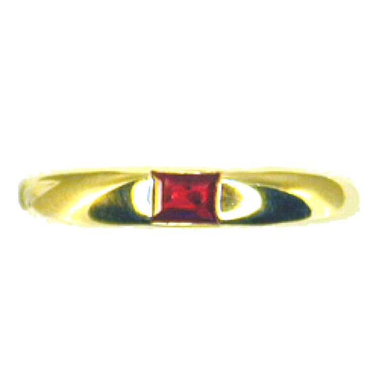An 18ct Yellow Gold Token Ring Set With A Baguette-cut  Ruby