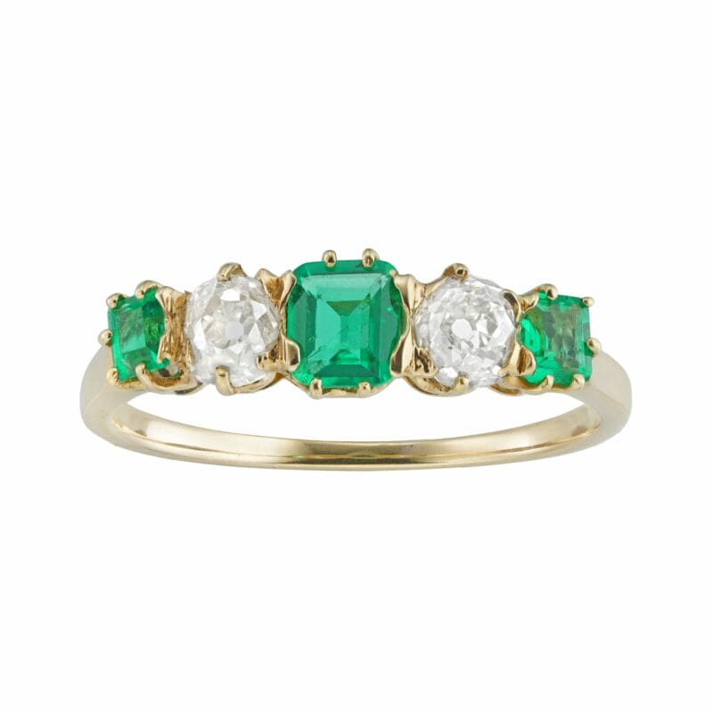 An Edwardian emerald and diamond five-stone ring
