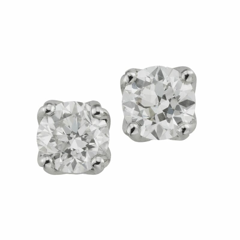 A pair of old brilliant-cut diamond stud earrings