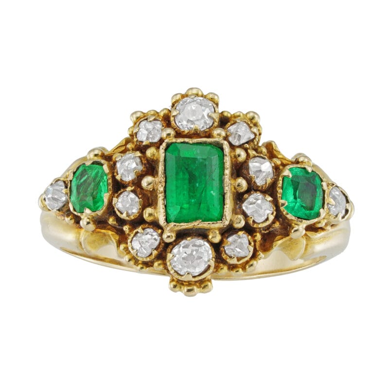 A Regency emerald  and diamond cluster ring