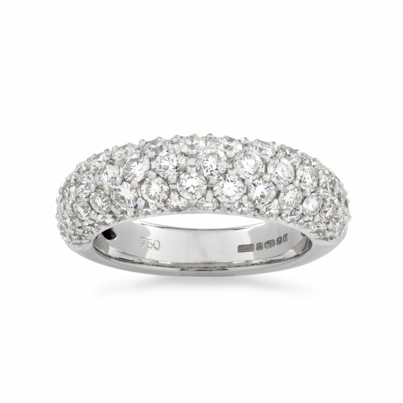A Bombé Style Diamond Set Half Eternity Ring,