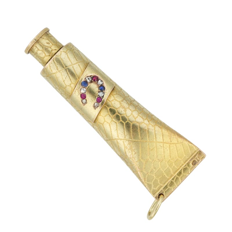 A jewelled gold trompe l’oeil scent bottle