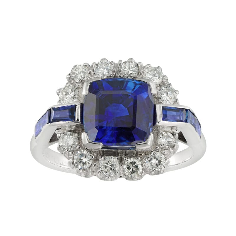 A mid-20th century sapphire and diamond cluster ring