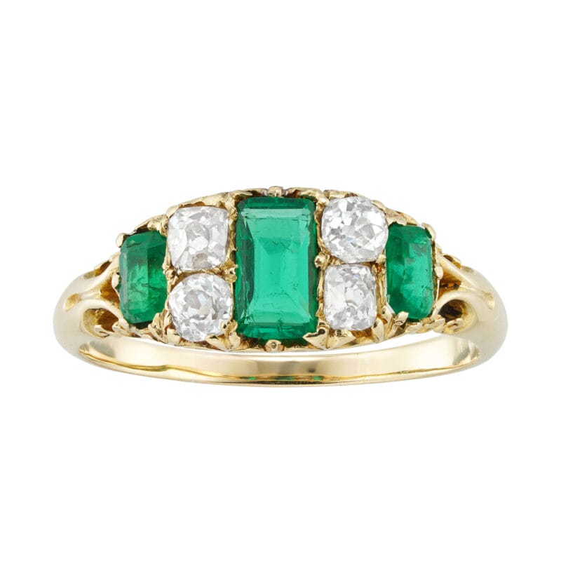 A late Victorian emerald and diamond ring