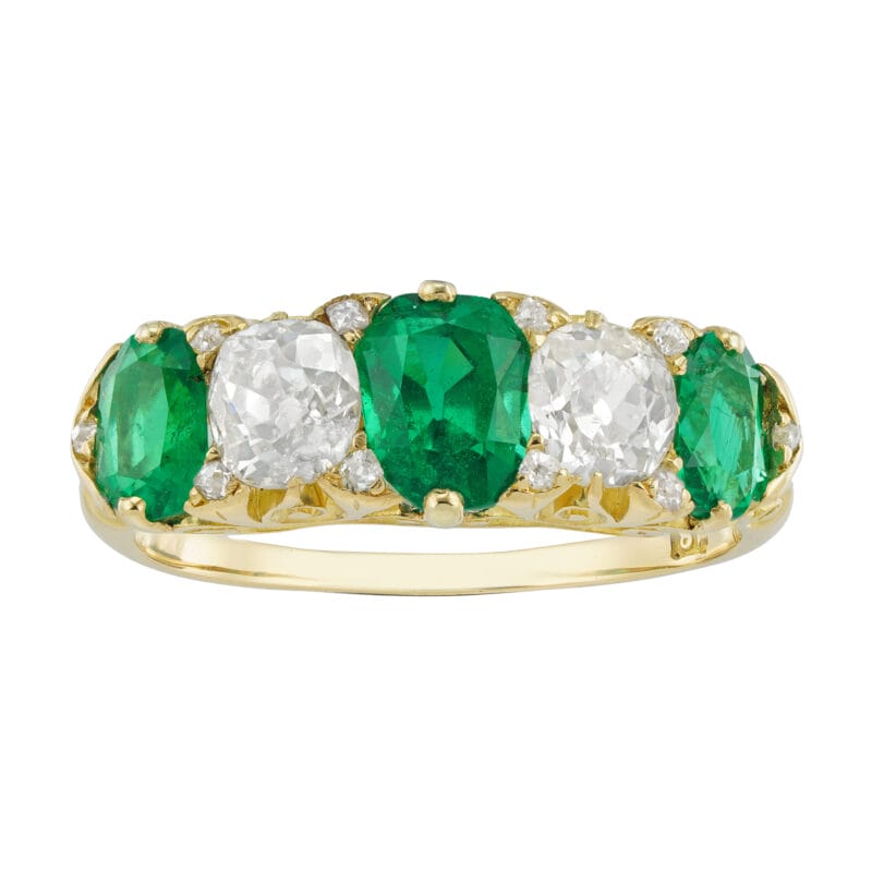 A Victorian five stone emerald and diamond ring