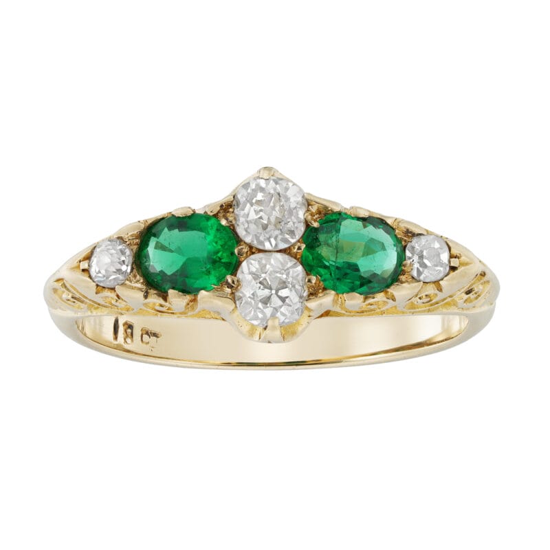 An Edwardian emerald and diamond-set ring