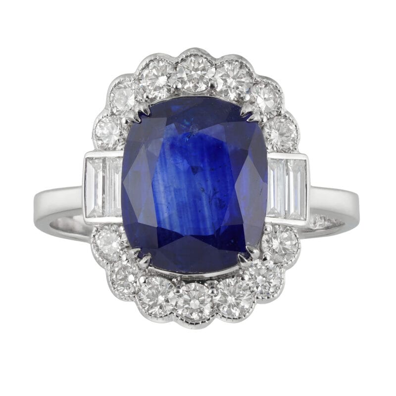 A cushion-shaped sapphire and diamond cluster ring