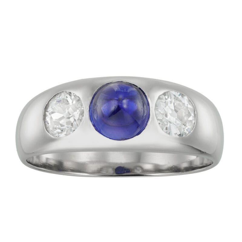 A colour-change sapphire and diamond gypsy-set ring