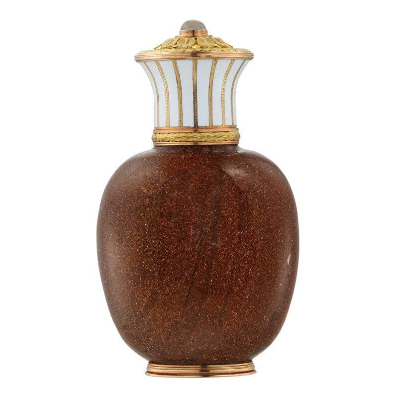A Fabergé goldstone-glass and enamel scent bottle