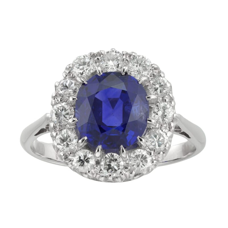 A mid 20th century sapphire and diamond cluster ring