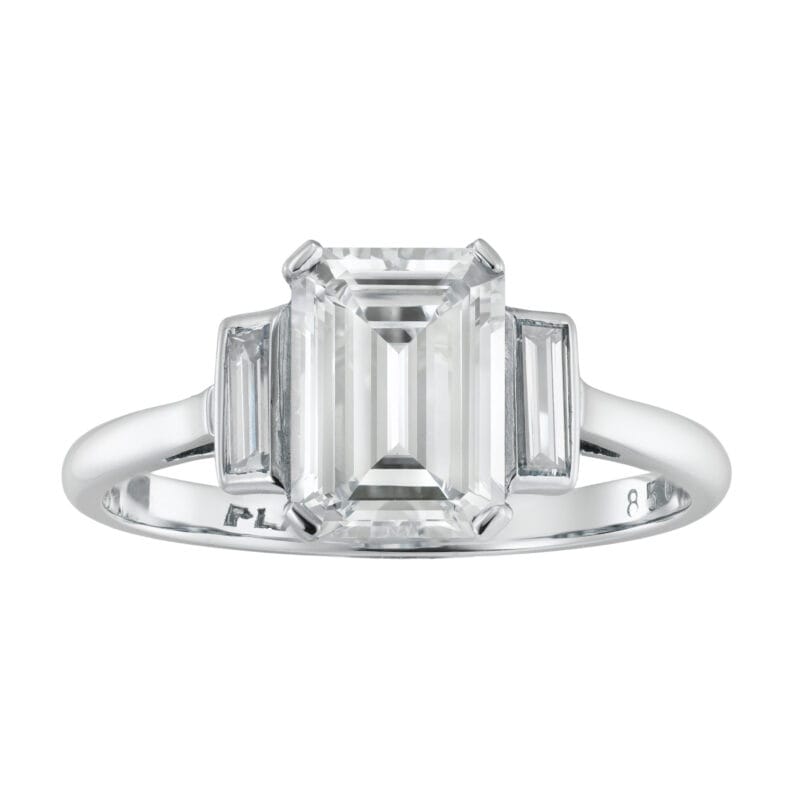 An emerald-cut diamond solitaire ring
