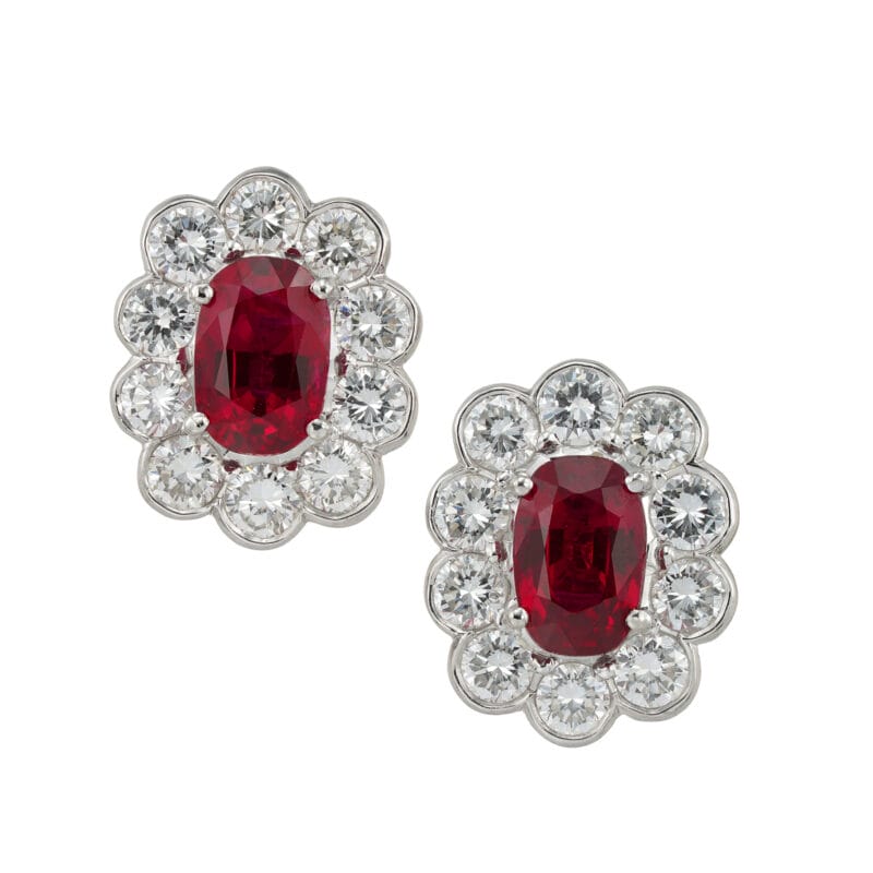 A pair of ruby and diamond cluster earrings