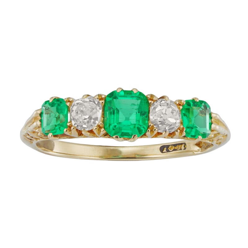 A late Victorian emerald and diamond carved hoop ring