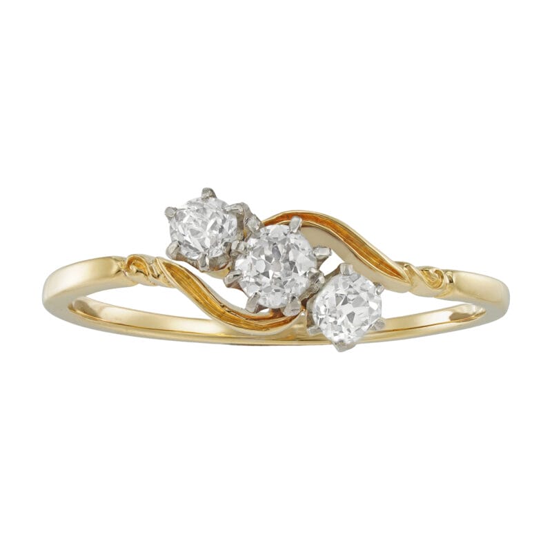 An Edwardian three-stone diamond ring