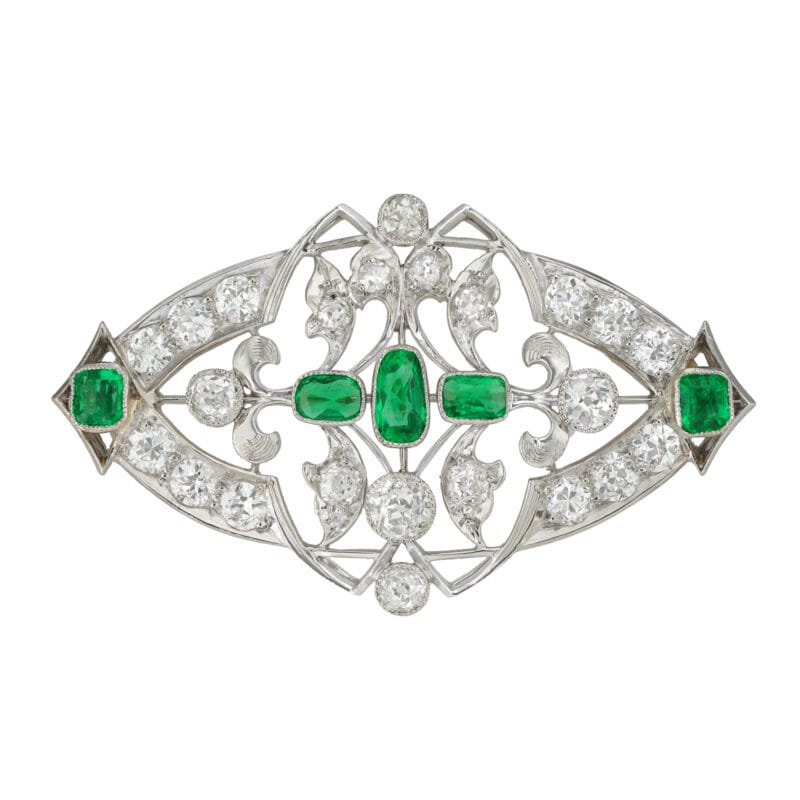 An early 20th century diamond and emerald plaque brooch
