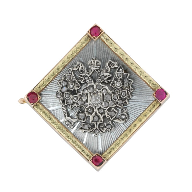 A Fabergé Ruby, Enamel, Gold And Diamond Brooch