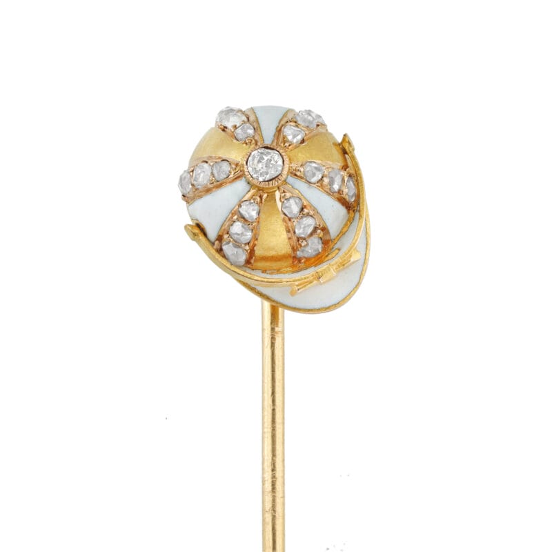 An Edwardian Enamel, Diamond And Gold Jockey-cap Pin