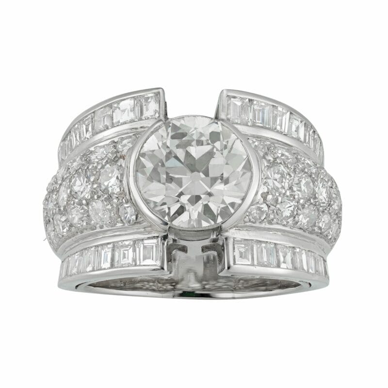 A French Art Deco bombé style diamond ring
