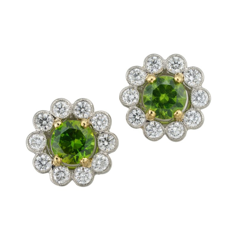 A pair of demantoid garnet and diamond cluster earrings