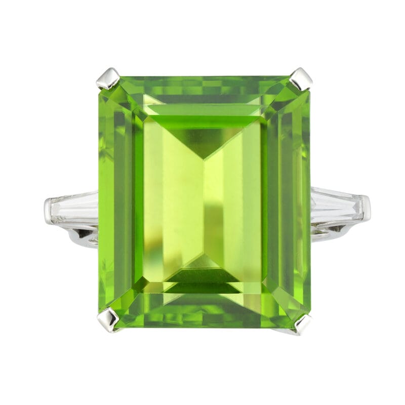 A peridot and diamond cocktail ring
